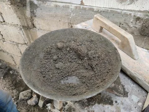 Cement and sand mixture ready for plastering work on building site Stock Photos