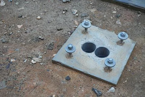 Cement and screw construction, base for street lights Fotos de archivo