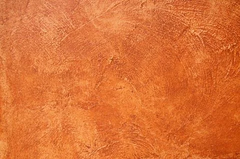 Cement background with a texture of a orange wall Stock Photos