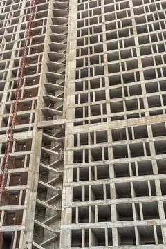 Cement base building under construction vertically, the initial stage of buil Stock Photos