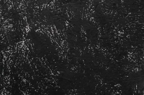Cement black wall with texture pattern. Stock Photos