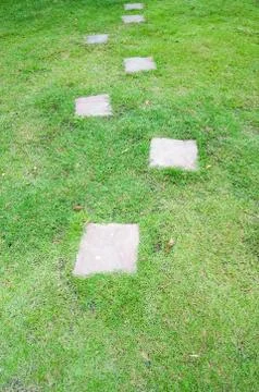 Cement block path in the garden Foto stock