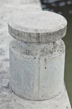 Cement columns on the coast Stock Photos