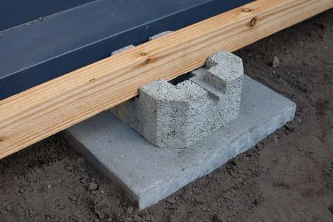Cement deck block foundation installed on the ground Stock Photos