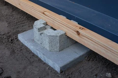 Cement deck block foundation installed on the ground Stock Photos
