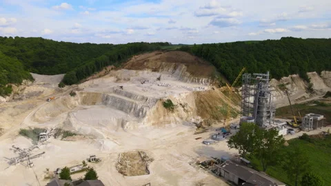 Cement factory at open pit mining of construction sand stone materials with Stock Footage 162021706