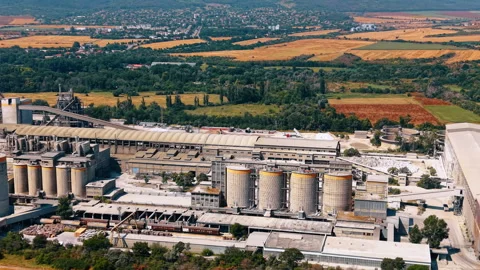 Cement factory silos and processing buildings from above Stock Footage 340079113