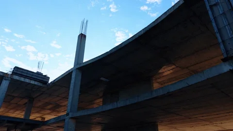 Cement floors of the future buildings. Low angle view at the high-rise under Stock Footage 321764841