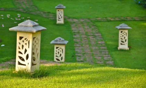 Cement lamp in the garden Stock Photos