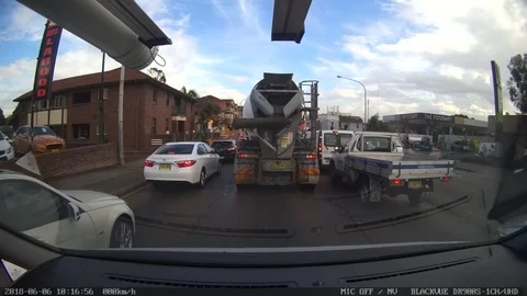 Cement lorry rams and drags Mercedes in hair-raising crash Stockbeeldmateriaal 106314105