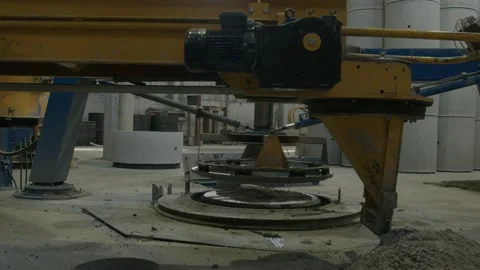 Cement making plant. The working process of making cement rings for sewage Stock Footage 237509208
