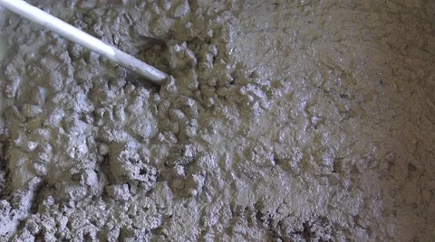 Cement Mix being checked with a Metal Rod Stock Footage 40217482