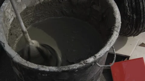 Cement is mixed in a bucket Stock Footage 112121962