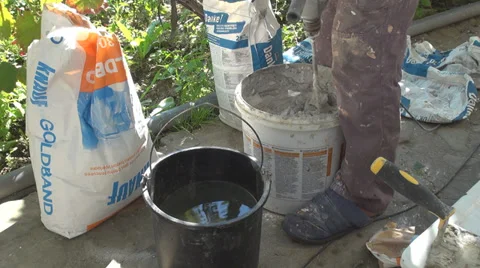 Cement mixer machine bucket plasterer  mortar construction site manual tool work Stock Footage 32693503