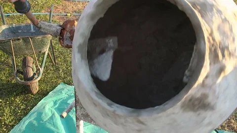 Cement mixer mixing the cement Stock Footage 75768423