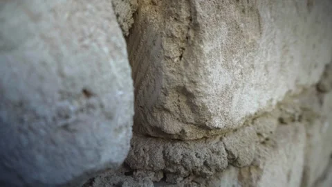 Cement Mortar Joints Between Limestone Blocks in House Wall Close Up 動画素材 345979612
