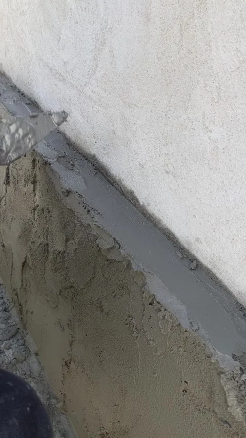 Cement plaster on brick wall construction Video stock 332567465