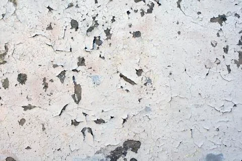 Cement plaster wall background with paint peeling off Stock Photos
