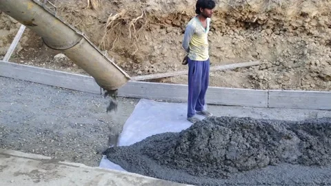 A cement preparing machine pour the cement on the road. Stock Footage 146796304