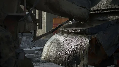Cement solution flows down the walls of the container Stock Footage 82132407