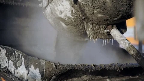 Cement solution is poured into the container Stock Footage 82132195