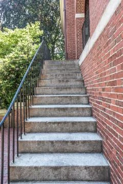 Cement stairs next to wall Stock Photos