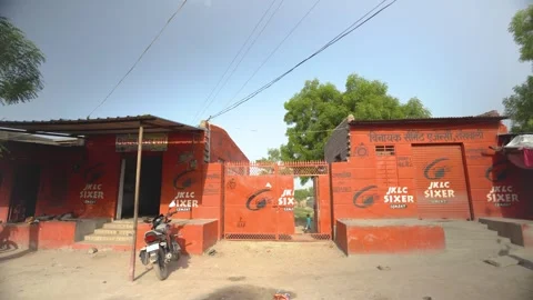 Cement Storefront with Motorcycles Stock Footage 325092028