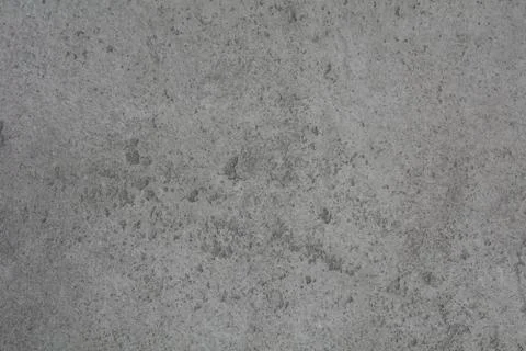 Cement texture with flat lighting - grey wall with chips and cracking Stock Photos