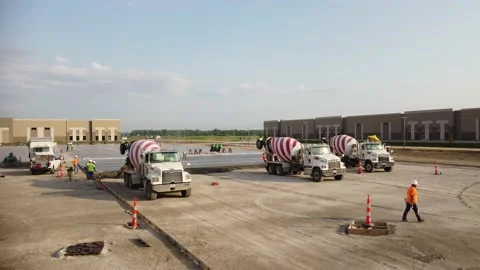 Cement Trucks and Construction Crew Stock Footage 158896091