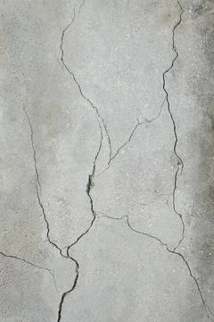 Cement wall cracks broken texture background Stock Photos