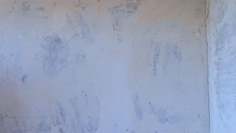 Cement wall during renovation after removing wallpapers from wall. Stock Footage 124948792