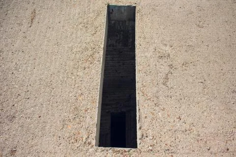 Cement wall with rectangle hole sewerage and electricity wiring Foto stock