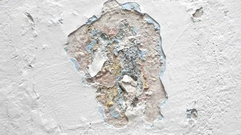 Cement wall texture background with peeling white paint Stock-Fotos