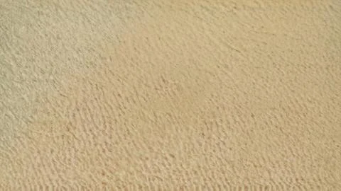 The cement wall with unique patterns looks beautiful, with a yellow backgroun Stock Photos