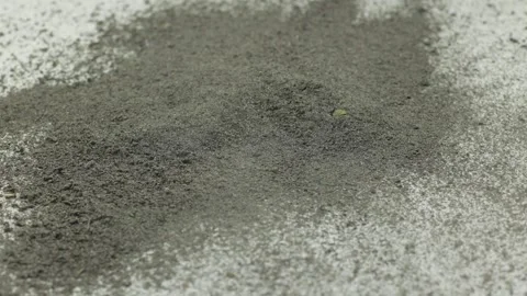 Cement on a white background. Cigarette ash is like cement, a lot of dust Stock Footage 245852008