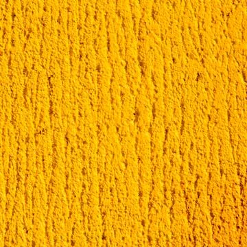 Cement yellow background Stock Photos