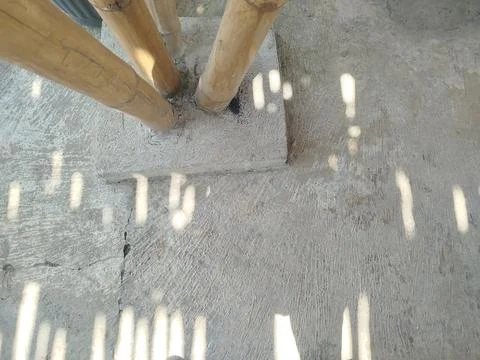 Cemented bamboo house support pillars on the ground 库存照片