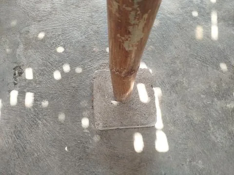 Cemented bamboo house support pillars on the ground 스톡 사진