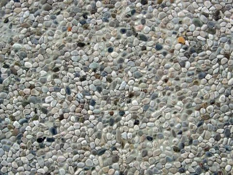 Cemented pebbles background Stock Photos