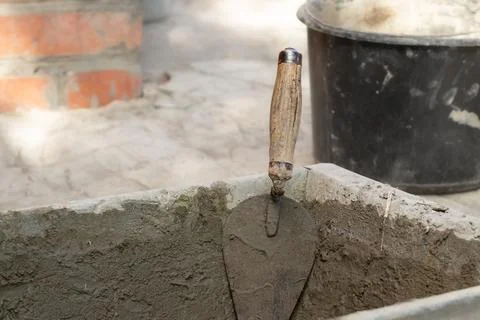 Cementing of a garden path.Do it yourself renovation. Stock Photos