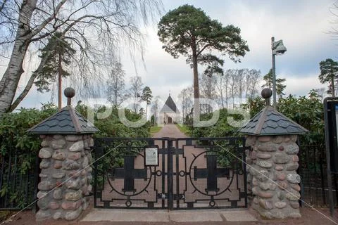 Cemetery and a small church Stock Photos