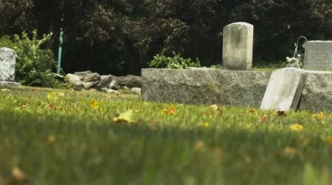 Cemetery - Graveyard - Low Shot in the grass Stock Footage 40908136