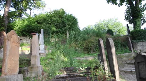 Cemetery on the hill, peaceful graveyard, 13th century gravestones, sunset Stock Footage 44893772