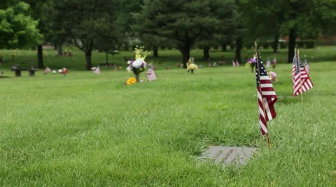 Cemetery on Memorial Day small flag by headstone 動画素材 38857092
