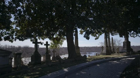 Cemetery with river in background Video stock 92097307