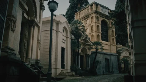Cemetery, sepulchres on a walking path Stock Footage 104923067