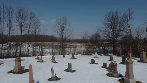 Cemetery Snow Covered (Tracking In Reverse) Stock Footage 149716715
