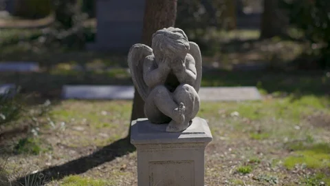 Cemetery statue of crying angel Stock Footage 92097686