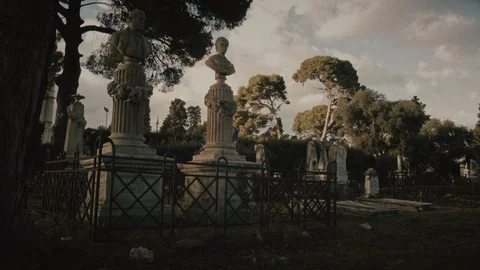 Cemetery, statues with trees Stock Footage 104923878