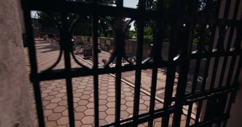 Cemetery Viewed Through Iron Gate Video stock 336604637